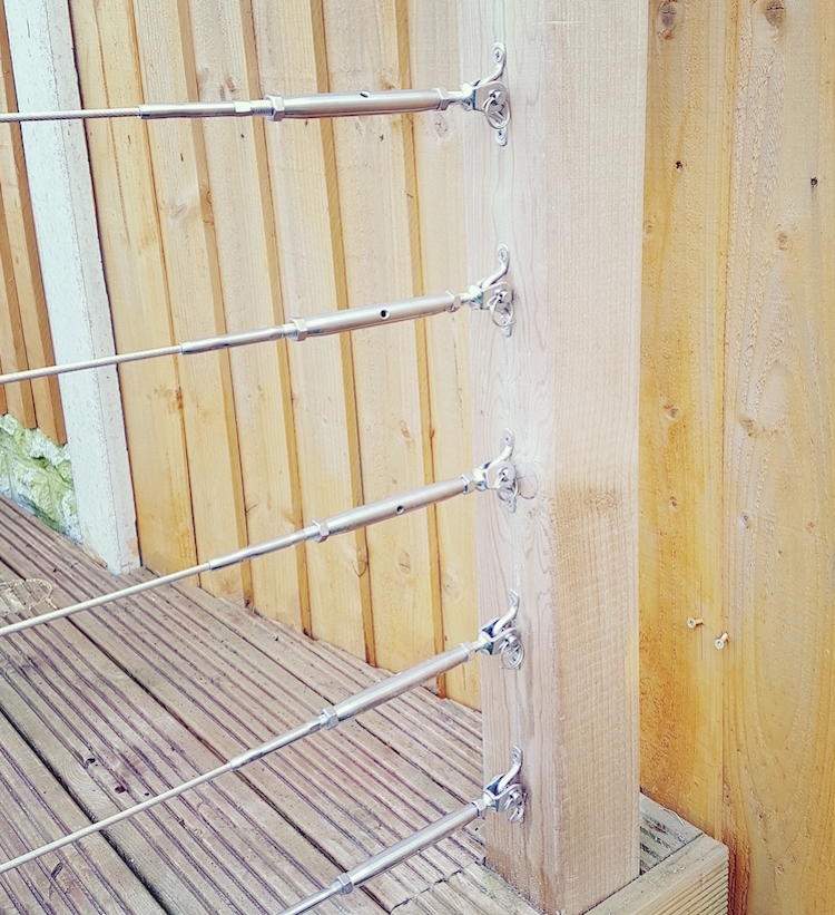 adjustable rigging screw with lacing eye strap attached to a timber post